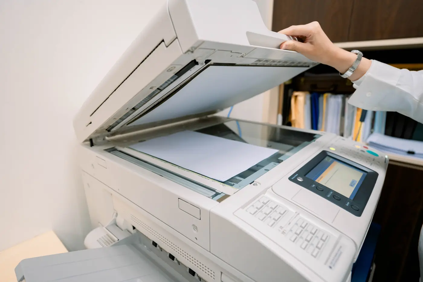 NOVUX team coordinating printing and daily office operations