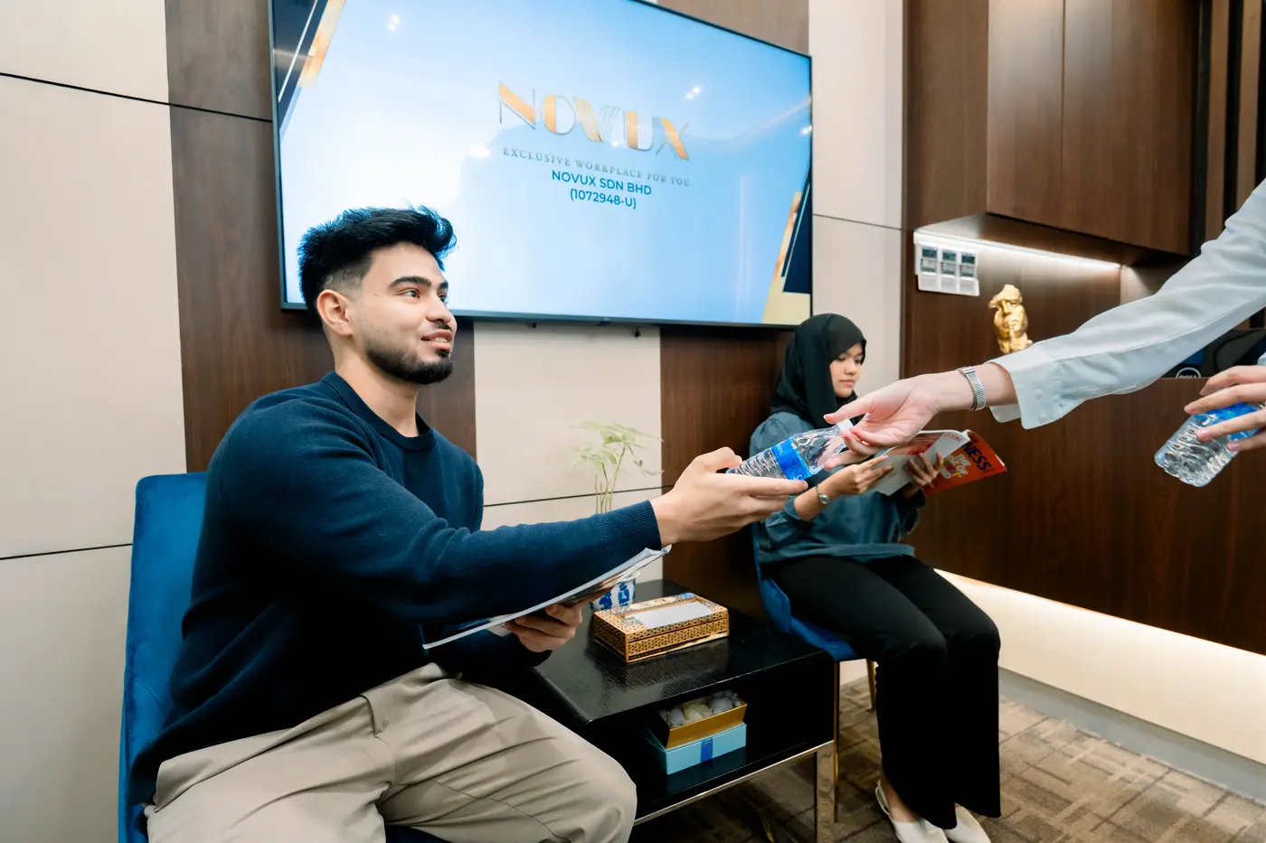 NOVUX team providing hospitality support to a client